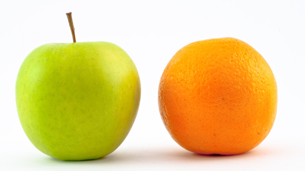 an apple and an orange to represent how different strategic initiative is from operational projects
